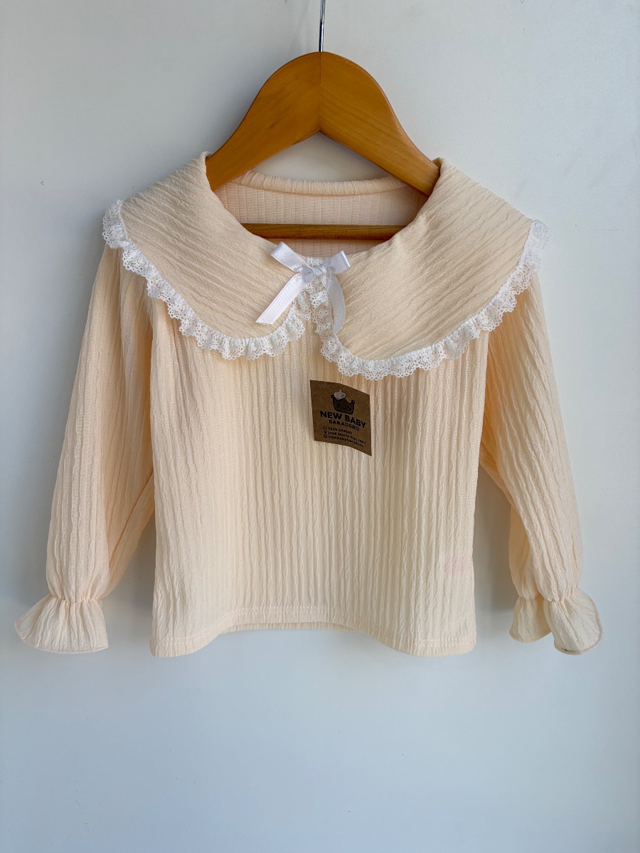 Blusa manteca con broderie