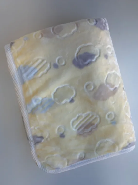 Frazada de cuna amarillo