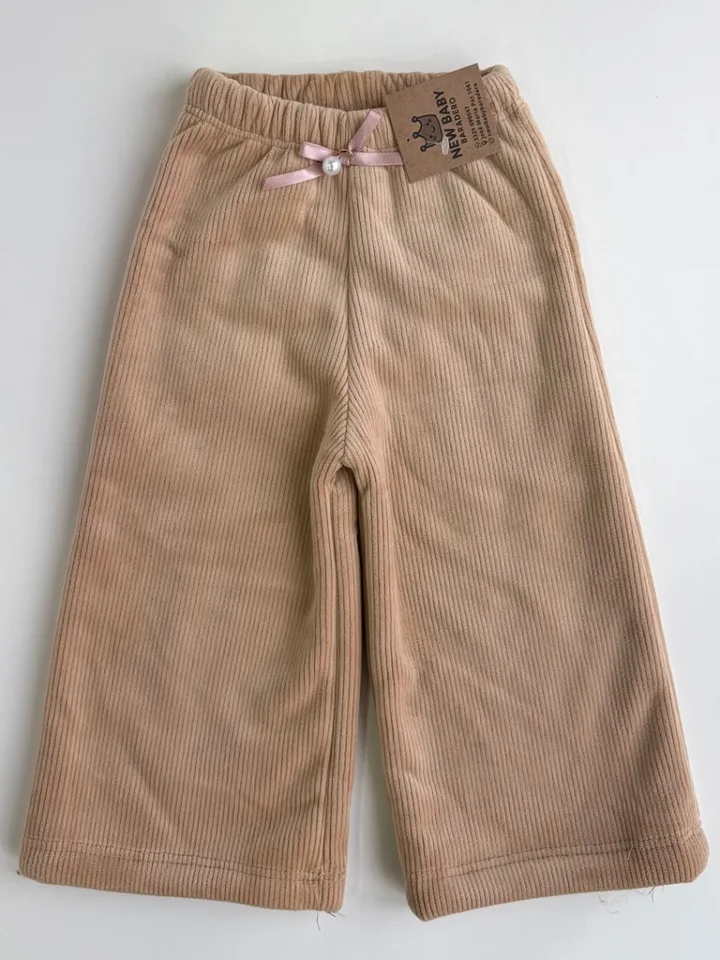 Pantalon palazo beige. Con corderito