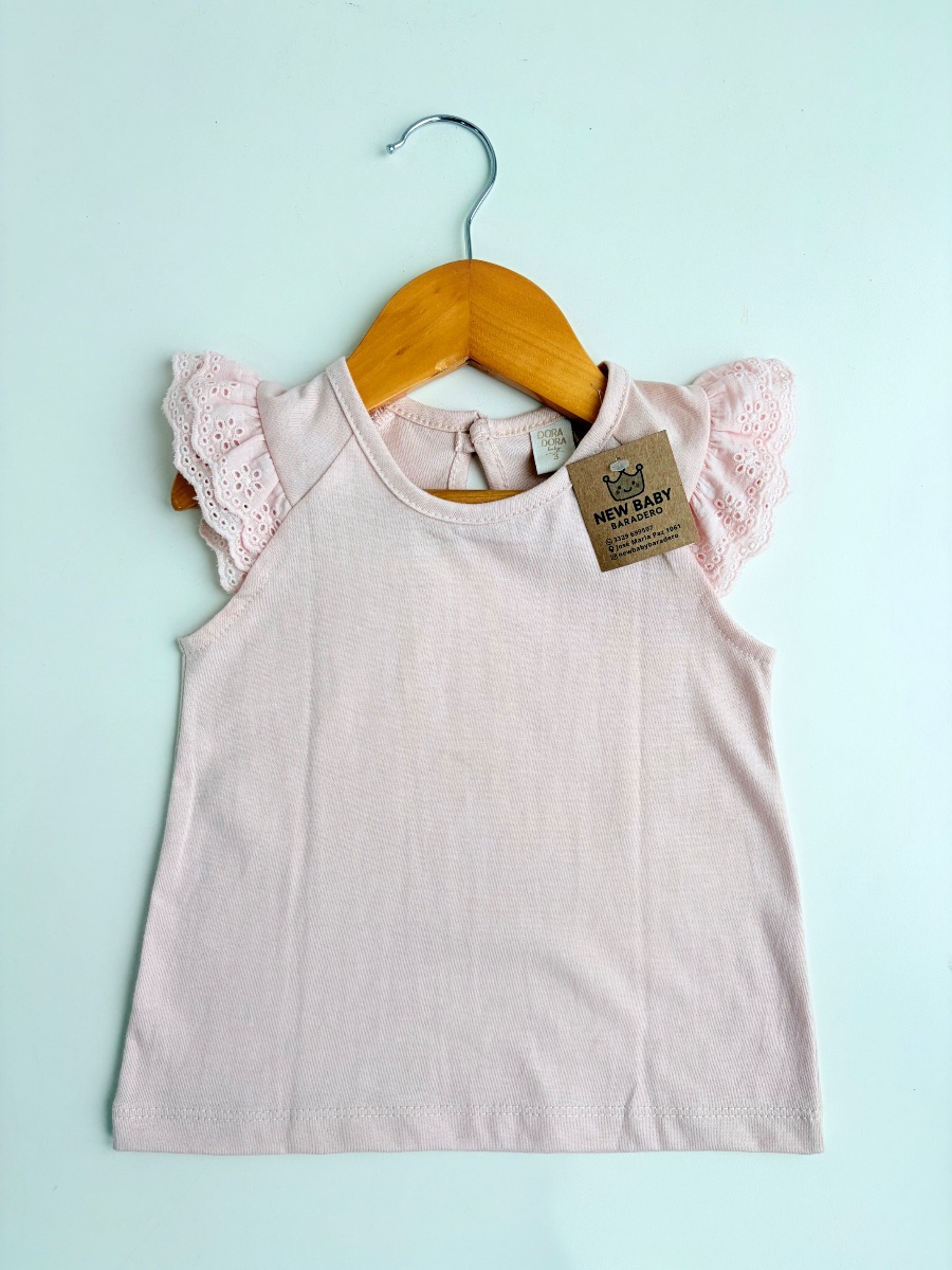 Reme con broderie rosa