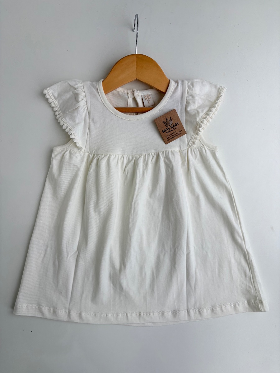Vestido con borlas natural